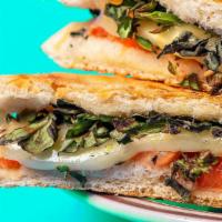 Mozzarella, Tomato & Basil Grilled Sandwich · Mozzarella, tomato and basil grilled sandwich on di lauro's ciabatta served with terrell's p...