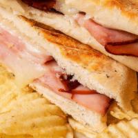 Ham & Swiss Grilled Sandwich · Smoked ham and swiss cheese grilled sandwich on di lauro's ciabatta served with terrell's po...