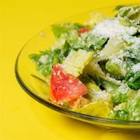 Caesar Salad · Chopped romaine, Caesar dressing, croutons, Parmesan, and tomatoes.