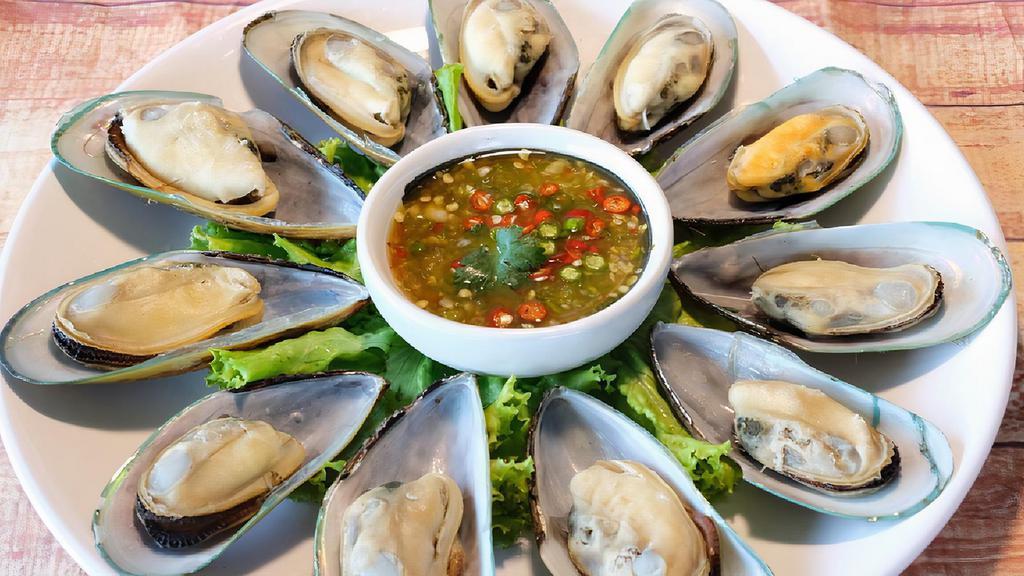 Steam Mussel · Steam mussel, lemongrass and basil leaves with seafood sauce