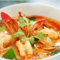 Tom Yum Shrimp Soup · Spicy lemongrass broth with shrimp, mushroom, scallion and cilantro.