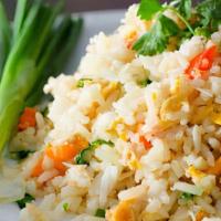 Thai Fried Rice · Stir-fried rice with egg, scallions, and onions.