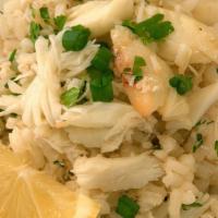 Crab Meat Fried Rice · Stir-fried rice with egg, scallions, and onions.