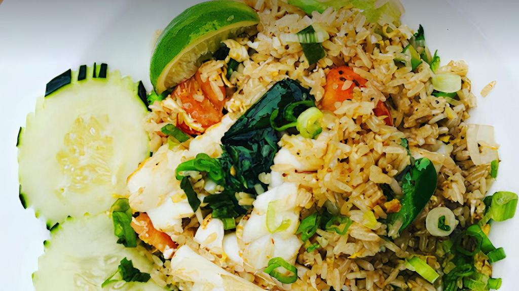 Green Curry Fried Rice · With Green curry paste, basil, bell pepper, onion, bamboo shoot, string bean and egg.