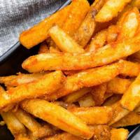 Cajun Fries 卡宴薯条 · Crispy fries lightly seasoned with Cajun spices.