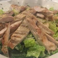 Caesar Salad · Romaine hearts, croutons, parmesan cheese, anchovy and traditional Caesar dressing salad.