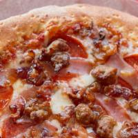 Meat Lovers · Pepperoni, ham, bacon, sausage, marinara sauce, mozzarella.