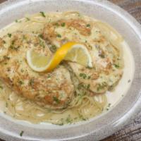 Chicken Francese · Chicken breast egg battered, sautéed in lemon butter and white wine sauce. Served with side ...