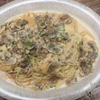 Chicken Marsala · Chicken breast with thinly sliced mushrooms in a marsala wine reduction.  Served with side s...