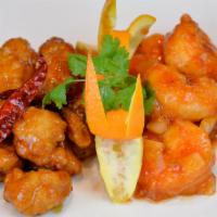 Dragon & Phoenix · Spicy. General Tso's chicken and jumbo shrimp in chili sauce.