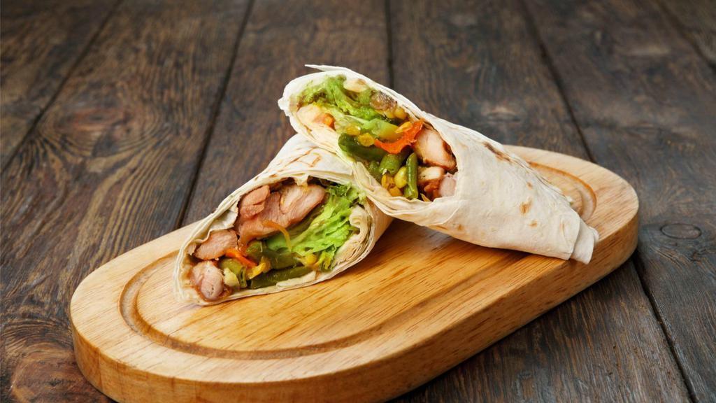 Bbq Chicken Wrap · Delicious Wrap made with BBQ chicken breast, avocado, romaine, Jack cheese and sun-dried tomatoes.