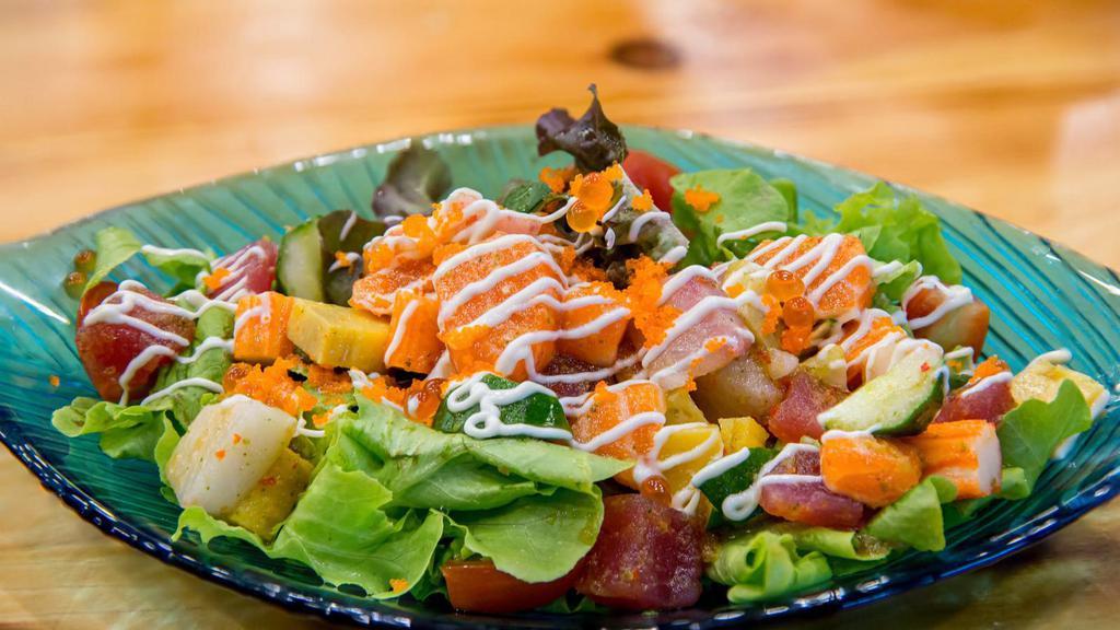 Spicy Sashimi Salad · An assortment of fresh sashimi over mixed greens.