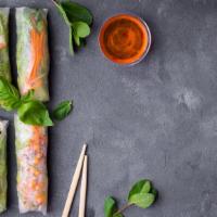 Summer Roll · Fresh Salad roll with shrimp wrapped in rice paper with a side of plum sesame dip.