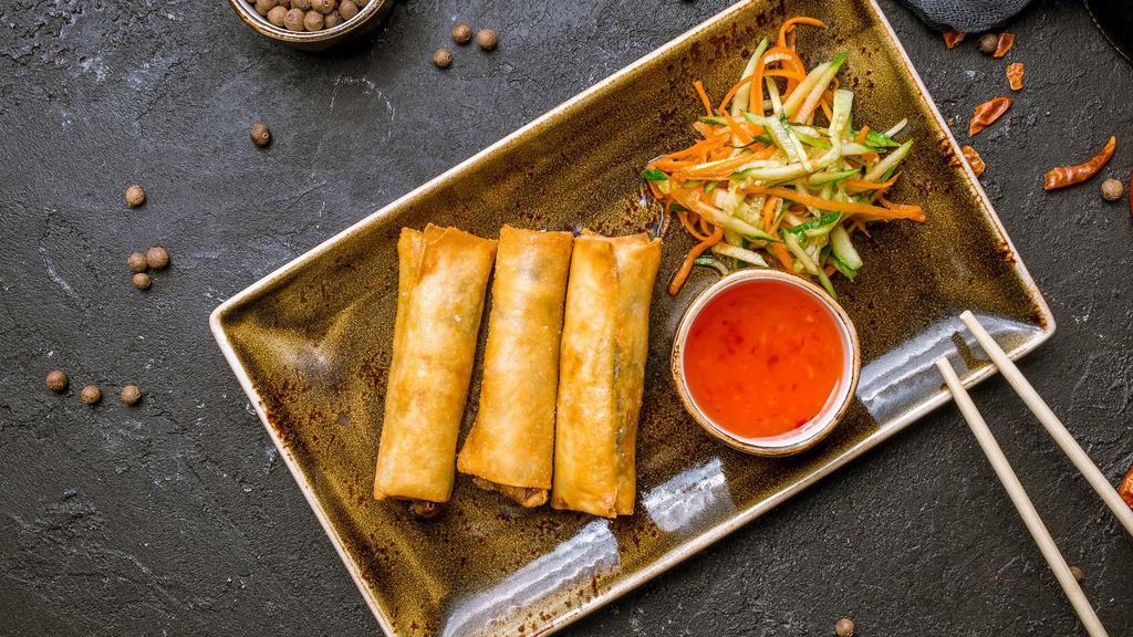 Vegetable Spring Rolls (3) · Crispy rolls filled with tender bamboo shoots, cabbage, carrots, and bean thread; served with a plum dipping sauce.
