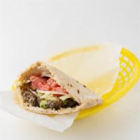 Classic Sandwich (Vegetarian) · Falafel and hummus:  served in a pita pocket with lettuce, tomatoes, onion, and tahineh sauce.