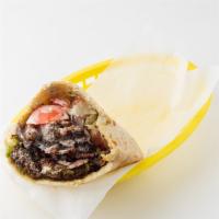 Macdougal Sandwich · Shawarma and Falafel:  served in a pita pocket with lettuce, tomatoes, onions, and tahineh s...
