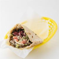 The East Village Sandwich (Vegetarian) · Vegetarian. Falafel, hummus and tabbouleh; served in a pita pocket with lettuce, tomatoes, o...