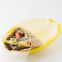 West Village (Vegetarian) · Falafel and Baba Ganouj: served in a pita pocket with lettuce, tomatoes, onions, pickles, an...