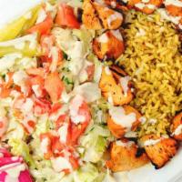 Chicken Kebob Plate · Marinated cubes of chicken breast, skewered and grilled; served over a choice of salad or se...