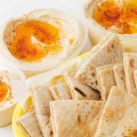 Hummus Side · Chickpea spread made with lemon, garlic and tahineh; served with pita bread.