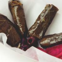 Grape Leaves · Vegetarian. Stuffed with white rice and spices (4 pieces).