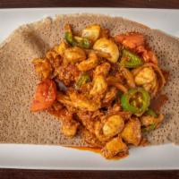 Doro Tibs · Chicken breast, diced, and marinated with onions, rosemary, and jalapeño and sautéed in oliv...