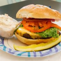 California Cheese Burger · 1/2 pound burger on keiser roll with lettuce, tomato, onions and mayo. served with pickle, m...