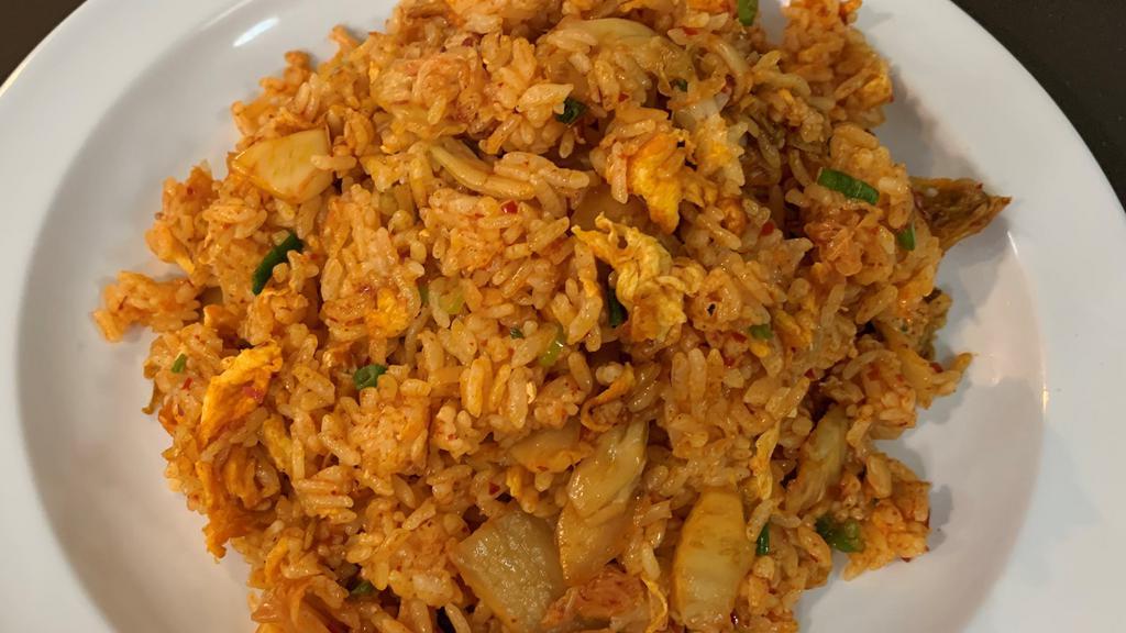 Kimchi Fried Rice (김치볶음밥) · Fried rice stir-fried with kimchi and choice of meat (beef, chicken, pork, shrimp )