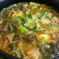 Hae Jang Guk (해장국) · ox bone stew with a variety of vegetables such as cabbages, onion, scallion and soybean paste