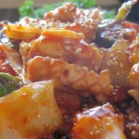 Pan Fried Calamari (오징어 볶음) · Pan fried calamari with mixed vegetables in sweet and spicy red pepper garlic sauce serve wi...