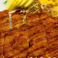 Katsu · Panko breaded and deep-fried meat  (chicken or pork) comes with  rice , salad with house mad...