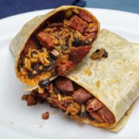 Breakfast Burrito · Two scrambled eggs, tomato, onions, home fries, cheese, and your choice of protein (bacon/ch...