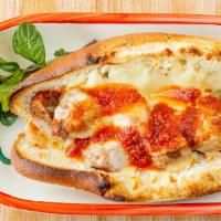 Meatball Parmigiana Hero · Topped with homemade meatballs and Parmesan cheese.