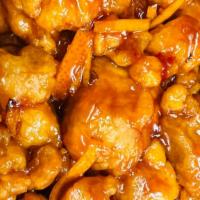 Orange Chicken (Large) · Spicy. Chunks of chicken fried crispy with orange peel in brown sauce.