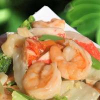 Seafood Delight (Large) · Shrimp, lobster meat, scallop, crab meat with vegetable in white sauce.