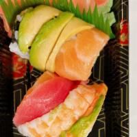 Rainbow Roll · California with salmon and tuna, shrimp, and avocado on top.