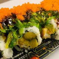 Fair Lawn Roll · Shrimp tempura, avocado top with seaweed salad, masago.