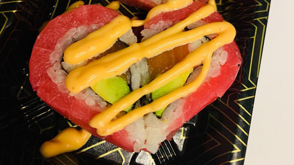 Valentine · Salmon, crabmeat, avocado with spicy tuna on top.