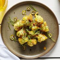 Crispy Rock Shrimp · Pickled serranos, green onions, and vadouvan dressing.