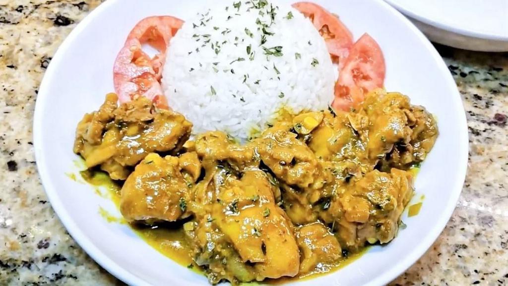Chicken Curry Stew · This classic Caribbean/Indian dish is a must try! Chicken legs are slowly simmered in fresh seasonings, vegetables and dry herbs.  Recommended with roti and plantains.