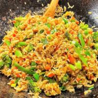 Loaded Vegetable Fried Rice · This classic Asian dish is bursting with crisp mixed vegetables and stir fried with an appet...