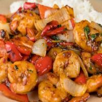 Spicy Honey Shrimp · These shrimps are the right balance of flavors, sweet and spicy, sautéed with vegetables and...