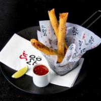 Crab Spring Rolls · Crab spring rolls filled with crab and mayo with a choice of ginger scallion sauce or sweet ...