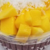Tropical Acai Bowl · 16 oz. Organic acai blended with mango, banana and almond milk. Toppings, granola, coconut f...