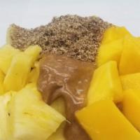 Almond Bliss Acai Bowl · Organic acai blended with banana, almond butter and almond milk. Topped with granola, pineap...
