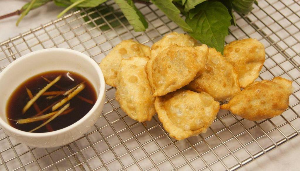 Juicy Pork Dumplings 猪肉韭菜饺 · 6 pieces. Juicy pork dumplings with soy-ginger dip.