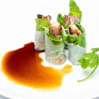 Cuon Diep · Seared tuna wrapped in mustard greens, sesame seeds, spicy soy.