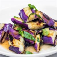 Ca Tim · Grilled eggplant with ginger, lime sauce.