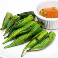 Dau Bap · Grilled okra serves with scallion ginger dipping sauce.