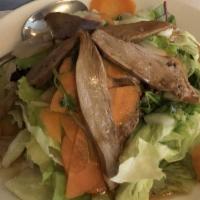 Goi Vit · warm duck over mixed greens, cilantro, daikon, pickled carrots